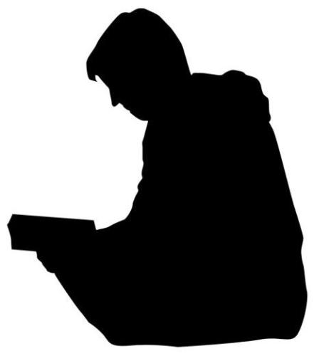 Sombra en posición de leer o estudiar.