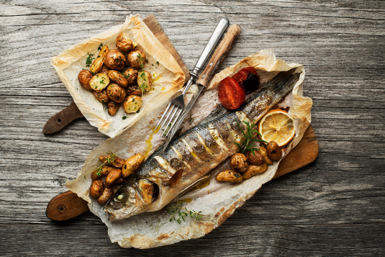 Lubina en papillote con patatas.