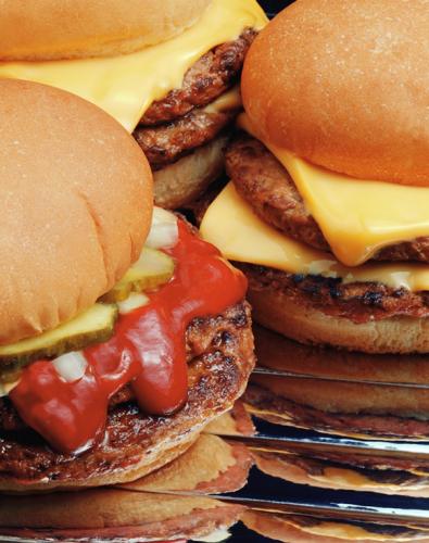 Hamburguesas con queso y kétchup de tomate.