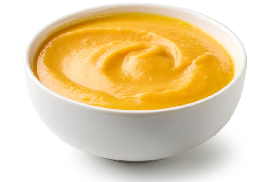 Un cuenco con puré de patata y zanahoria.