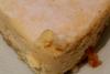 Un trozo de tarta de queso.